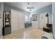 Bright bedroom with pull down bed and ceiling fan at 2941 Marlberry Ln, Clermont, FL 34714