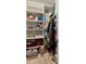 Walk-in closet with extensive shelving for optimal organization at 2941 Marlberry Ln, Clermont, FL 34714