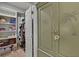 Walk-in closet and ornamental wardrobe provide ample storage space at 2941 Marlberry Ln, Clermont, FL 34714