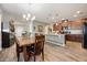 Open concept features a kitchen, dining area, seamlessly connected for modern living at 2941 Marlberry Ln, Clermont, FL 34714