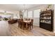 Living space includes a dining area with a chandelier and seamless connection to other living spaces at 2941 Marlberry Ln, Clermont, FL 34714