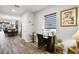 Cozy office space with natural light, wood floors, and stylish accents at 2941 Marlberry Ln, Clermont, FL 34714
