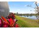 Enjoy serene pond views from this home's lush backyard, perfect for tranquil outdoor living at 2941 Marlberry Ln, Clermont, FL 34714