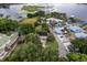 Aerial view of the property showcasing its expansive lot, mature trees, and desirable neighborhood setting at 3241 Downs Cove Rd, Windermere, FL 34786