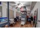 Spacious basement with ample storage space, shelving, and laminate flooring at 3241 Downs Cove Rd, Windermere, FL 34786