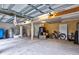 Spacious garage featuring ample storage, workshop area, and easy access for vehicles and projects at 3241 Downs Cove Rd, Windermere, FL 34786