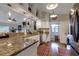 Modern kitchen featuring granite countertops, stainless steel appliances, and an open layout at 3241 Downs Cove Rd, Windermere, FL 34786