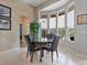Bright breakfast nook with large windows overlooking the backyard and pool at 3840 Caledonia Ave, Apopka, FL 32712