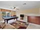 Spacious game room featuring a pool table, a bar area, and cozy seating space at 3840 Caledonia Ave, Apopka, FL 32712