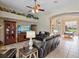 Open living space featuring a fireplace, media center, and seamless flow at 3840 Caledonia Ave, Apopka, FL 32712