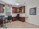 Spacious home office with built-in shelving and a bright window for a productive atmosphere at 3840 Caledonia Ave, Apopka, FL 32712