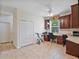 Office with a built-in desk, overhead cabinets, and a large storage closet perfect for working at home at 3840 Caledonia Ave, Apopka, FL 32712