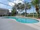 Sparkling screened-in pool featuring lush landscaping and a spa feature, perfect for relaxation and entertainment at 3840 Caledonia Ave, Apopka, FL 32712