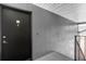 A close up showing the door to unit number 4 with neutral colors and hardware at 4160 Pershing Pointe Pl # 4, Orlando, FL 32822