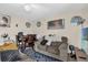 A shot of the living room featuring cozy seating, dining table, and neutral decor at 4160 Pershing Pointe Pl # 4, Orlando, FL 32822
