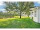 Spacious backyard with lawn and pond view at 4301 Heirloom Rose Pl, Oviedo, FL 32766