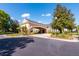 Elegant community entrance showcasing beautiful architecture and landscaping at 4301 Heirloom Rose Pl, Oviedo, FL 32766