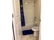 This bathroom features a white tiled shower and tub combo perfect for relaxation at 4427 Blackbird St, Kissimmee, FL 34746