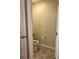 Bathroom with tile floors, toilet, and neutral wall paint color at 4427 Blackbird St, Kissimmee, FL 34746