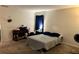 Bedroom with carpet flooring and neutral wall paint color at 4427 Blackbird St, Kissimmee, FL 34746