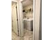 Laundry room with washer and dryer, neutral wall paint color, and tile floors at 4427 Blackbird St, Kissimmee, FL 34746