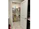 Walk-in pantry showcasing ample shelving space for organized storage at 4427 Blackbird St, Kissimmee, FL 34746