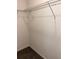 A walk-in closet with a wire shelving rack and carpet flooring at 4427 Blackbird St, Kissimmee, FL 34746