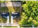 Overhead shot of two new homes, showing the proximity and lot layouts in a lush, green neighborhood at 4919 Nw 61St Ct, Ocala, FL 34482