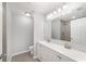 Bathroom featuring double sinks and a large mirror at 4919 Nw 61St Ct, Ocala, FL 34482
