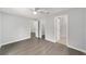 Spacious bedroom featuring ceiling fan and two large closets at 4919 Nw 61St Ct, Ocala, FL 34482