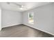 This bedroom features a ceiling fan and lots of light at 4919 Nw 61St Ct, Ocala, FL 34482