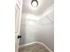 Walk-in closet with wire shelving and modern flooring at 4919 Nw 61St Ct, Ocala, FL 34482