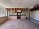 Enclosed patio with brick flooring, rustic wood and stucco exterior, and natural light at 4981 Lake Cecile Dr, Kissimmee, FL 34746