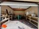 Interior of shed featuring shelving, windows, and equipment, perfect for storage or workshop space at 4981 Lake Cecile Dr, Kissimmee, FL 34746