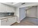 Bright kitchen with ample cabinet space and an open layout to the living area at 5039 Jamaica # 10, Orlando, FL 32808