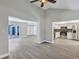 Open-concept living space with modern flooring, open to the kitchen at 5039 Jamaica # 10, Orlando, FL 32808