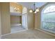 Dining room with arched windows and elegant lighting fixtures, perfect for gatherings at 508 Key Ct, Orlando, FL 32828