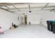 Spacious two-car garage has a clean interior, with an entrance to the home at 508 Key Ct, Orlando, FL 32828