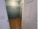 Organized walk-in closet with shelving, providing ample storage space at 51 Windtree Ln # 101, Winter Garden, FL 34787
