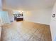 Bright living room with tile flooring and ample space for entertaining at 51 Windtree Ln # 101, Winter Garden, FL 34787