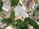 Stunning aerial view of a large home with mature trees on a spacious lot at 5852 Medinah Way, Orlando, FL 32819