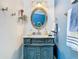 Quaint bathroom exhibiting ornate vanity and brushed fixtures, adding a touch of sophistication at 5852 Medinah Way, Orlando, FL 32819