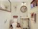 Elegant bathroom with decorative vanity, framed mirror, and marble tile at 5852 Medinah Way, Orlando, FL 32819
