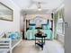 Relaxing bedroom featuring a canopy bed, cool colors, and plenty of natural light at 5852 Medinah Way, Orlando, FL 32819