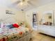 Inviting bedroom with bright, natural light and a spacious vanity with mirror at 5852 Medinah Way, Orlando, FL 32819
