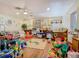 Spacious bedroom displaying hardwood floors, play area, and playful decor ideal for creating a fun space at 5852 Medinah Way, Orlando, FL 32819
