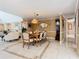 Dining room with neutral paint, elegant tile flooring, and stylish accents at 5852 Medinah Way, Orlando, FL 32819