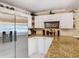 Kitchen featuring stainless steel refrigerator and granite countertops at 5852 Medinah Way, Orlando, FL 32819