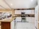 Modern kitchen with stainless steel appliances and a functional layout at 5852 Medinah Way, Orlando, FL 32819