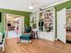 Large living room featuring built-in bookshelves and an open floor plan at 5852 Medinah Way, Orlando, FL 32819
